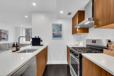 Perched on the 12th floor of Hudson View East, #12G is a - photo 3