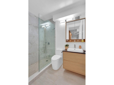 Perched on the 12th floor of Hudson View East, #12G is a - photo 4