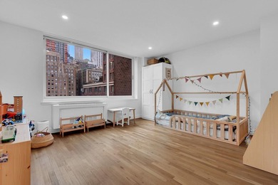 Perched on the 12th floor of Hudson View East, #12G is a - photo 6