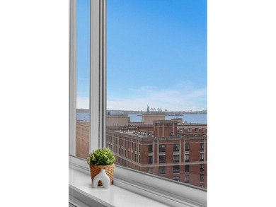 Perched on the 12th floor of Hudson View East, #12G is a - photo 8