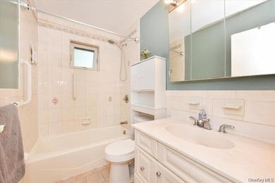 Welcome To 295 Merrick Road, Unit 4A ! This Maintenance Free - photo 13