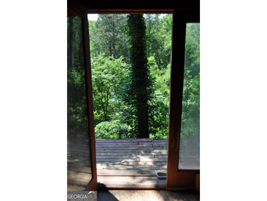 STOP! STOP! Oh what a retreat this would be. This property is - photo 13