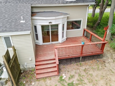 Charming Cottage-Style New Englander! Step into this delightful - photo 3