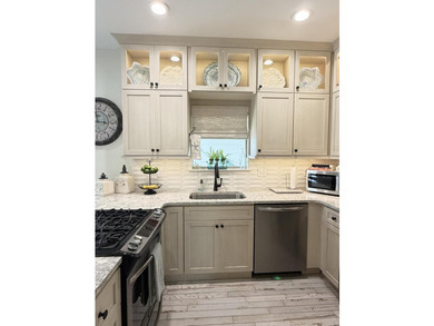 Located one block from Crystal beach and move-in ready...a - photo 12