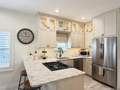 Located one block from Crystal beach and move-in ready...a - photo 13