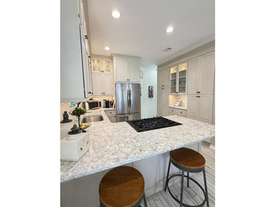 Located one block from Crystal beach and move-in ready...a - photo 18