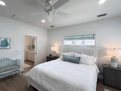 Located one block from Crystal beach and move-in ready...a - photo 20