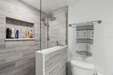Captivating waterfront vistas await in this meticulously updated - photo 22