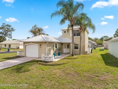 ~ BRAND NEW METAL ROOF ~ Welcome to Bermuda Walk! This charming - photo 1