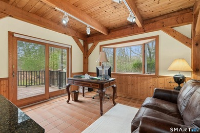 Perched high on 2 private acres, this home is an ideal full-time - photo 12