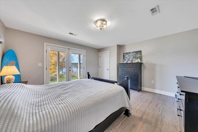 Never worry about water depth at this home's double slip party - photo 23