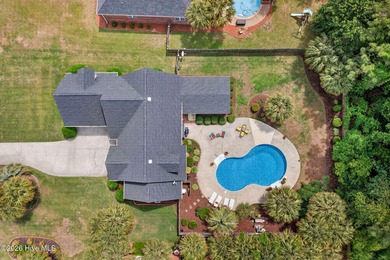 Situated in the estate section of Wedgefield at Crosswinds on a - photo 2