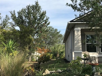 This well-maintained home sits on a quiet street in the popular - photo 3