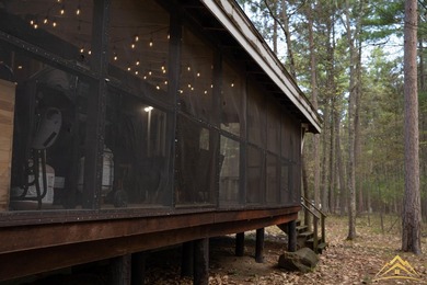 Tucked among the pines of Au Sable Acres, this fully furnished - photo 22