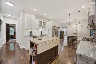 Set on a beautifully landscaped, nearly one-acre lot in The - photo 20