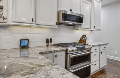 Set on a beautifully landscaped, nearly one-acre lot in The - photo 22