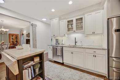 Set on a beautifully landscaped, nearly one-acre lot in The - photo 24