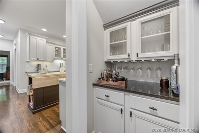 Set on a beautifully landscaped, nearly one-acre lot in The - photo 28