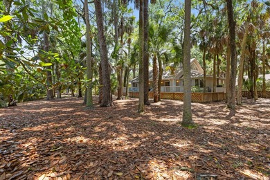 Updated lagoon-front home on one and a half lots in a quiet - photo 43