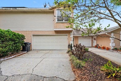 Centrally located in Titusville, this 2-bedroom, 2.5-bath - photo 1