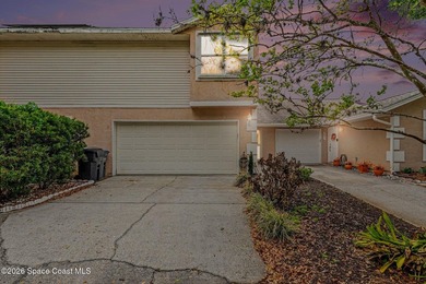 Centrally located in Titusville, this 2-bedroom, 2.5-bath - photo 2