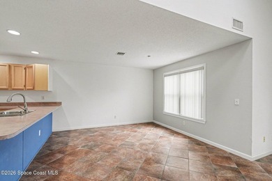 Centrally located in Titusville, this 2-bedroom, 2.5-bath - photo 9