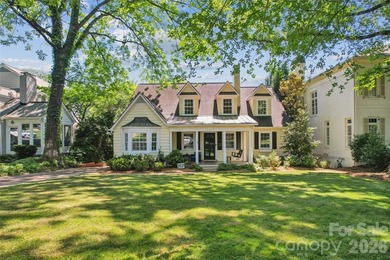 Exceptional opportunity in Myers Park! This 1.5-story, daylight - photo 1