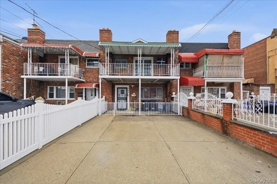 Welcome to this charming two-family Colonial-style duplex in the - photo 1
