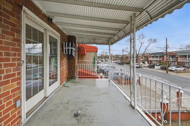 Welcome to this charming two-family Colonial-style duplex in the - photo 2