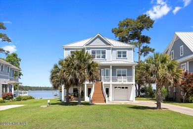Experience true waterfront living in this custom-built dream - photo 1