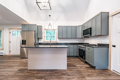 Discover this immaculately crafted, modern farmhouse in - photo 3