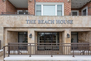 Experience the ultimate coastal lifestyle in this rare - photo 2