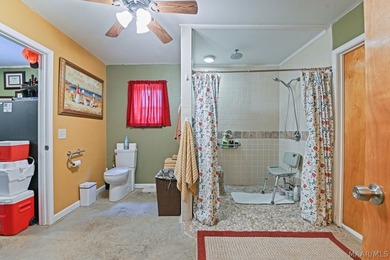 Charming 3 bedroom, 2 bath barndominium-style home offering - photo 26