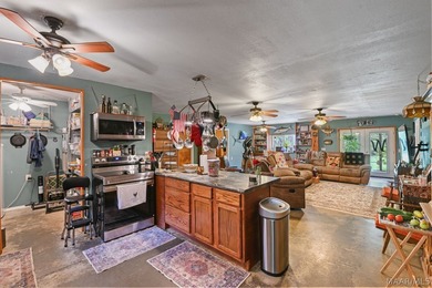 Charming 3 bedroom, 2 bath barndominium-style home offering - photo 37