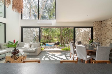 Villa 2 is a remarkable 4-bedroom, 4-bathroom residence nestled - photo 9