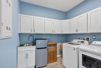 Experience low-maintenance living in LakePark at Tradition, an - photo 23