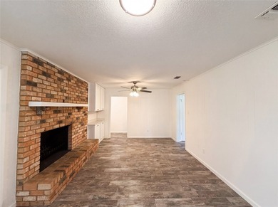 Welcome to 7928 Ella Young Dr, where fresh interior paint - photo 3