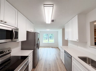 Welcome to 7928 Ella Young Dr, where fresh interior paint - photo 6