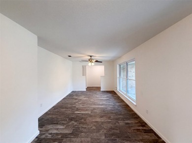 Welcome to 7928 Ella Young Dr, where fresh interior paint - photo 7