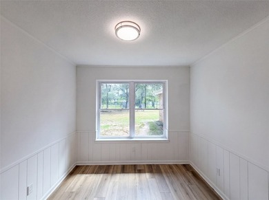 Welcome to 7928 Ella Young Dr, where fresh interior paint - photo 10