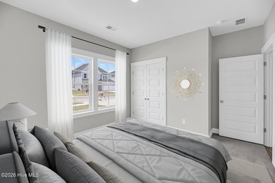 This Bates II plan features four bedrooms and two bathrooms and - photo 12