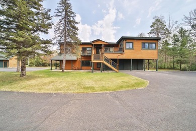 A rare opportunity to own on the Gull Lake Chain! This beautiful - photo 1