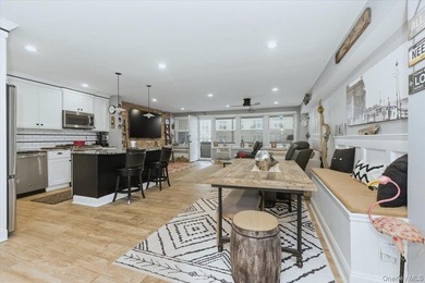 Welcome to The Beach!!!! Own this GORGEOUS Unit just in time for