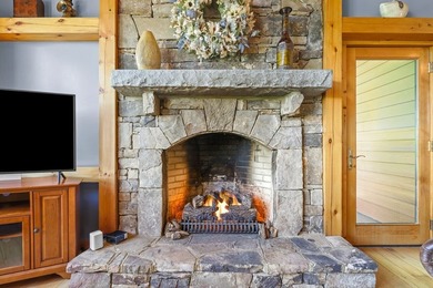 Perched within the sought-after gated community of Fontana Lake - photo 16