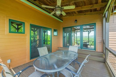 Perched within the sought-after gated community of Fontana Lake - photo 43