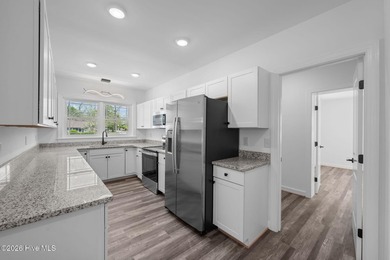 Step into this beautifully restored 1940's home, now with modern - photo 14