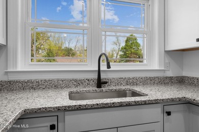 Step into this beautifully restored 1940's home, now with modern - photo 17