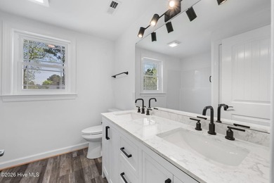 Step into this beautifully restored 1940's home, now with modern - photo 30