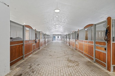 This 6-acre equestrian estate in Saddle Trail, is a top-tier - photo 15