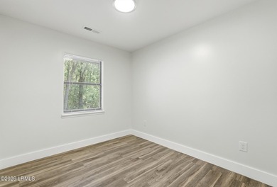 This beautifully updated 4-bedroom, 2-bath home offers almost - photo 25